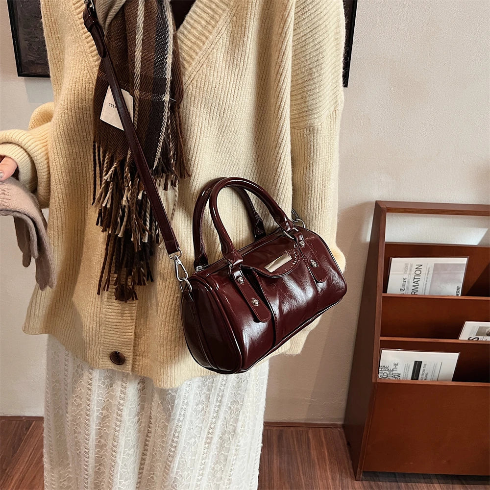 Mini burgundy PU leather top-handle bag with a detachable crossbody strap