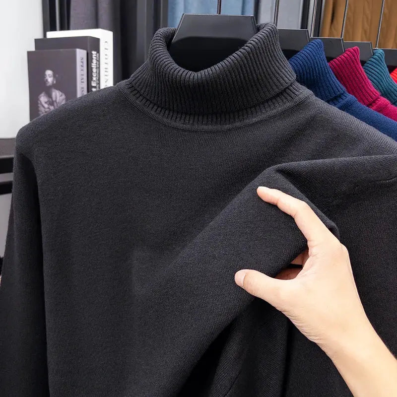 Men's black knitted turtleneck sweater on a hanger; slim fit, anti-pilling, solid color.