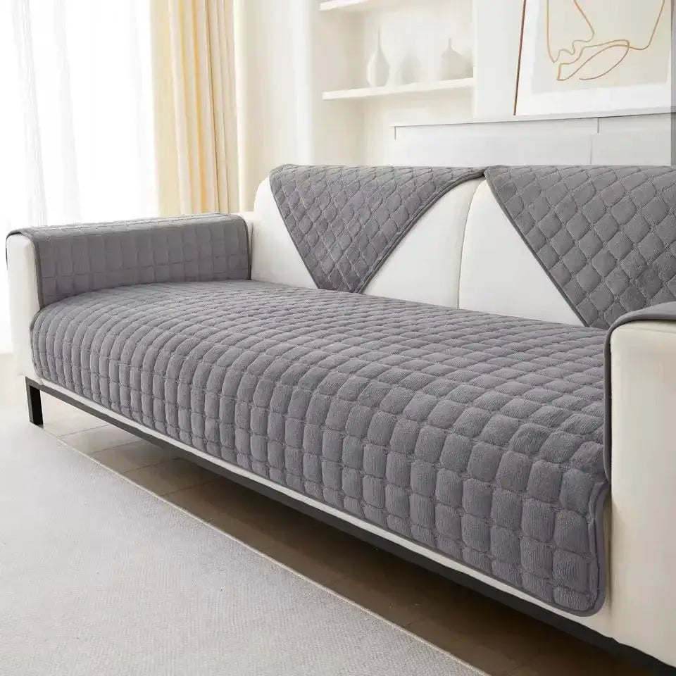 Flannel plaid sofa cover set in gray quilted fabric for cushions and backrest, non-slip.