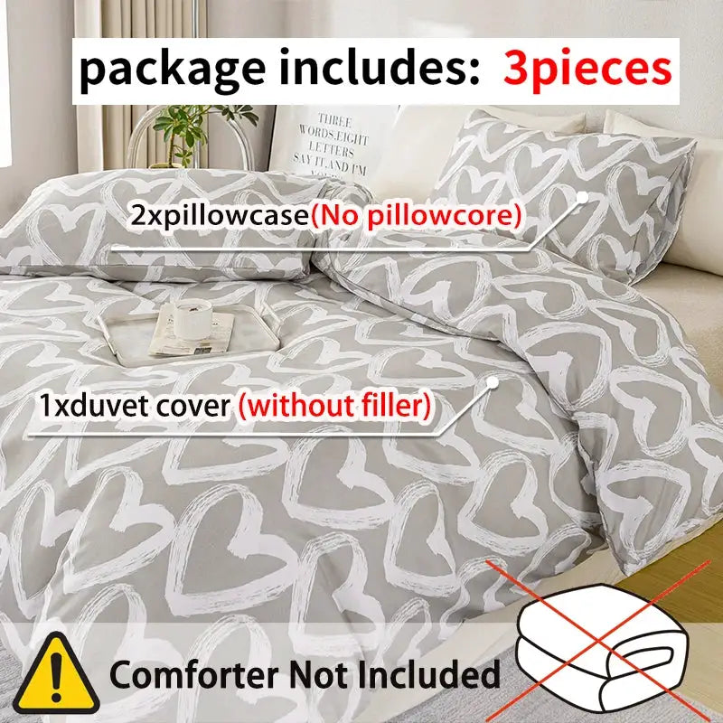 Heart‑print duvet cover set in blue and gray; 3‑piece with 1 duvet cover and 2 pillowcases by Simples Market