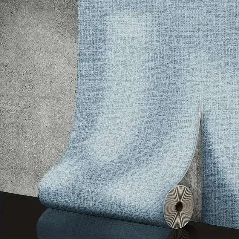 Self-adhesive foam wall panel roll in light blue linen texture, 50cm wide.
