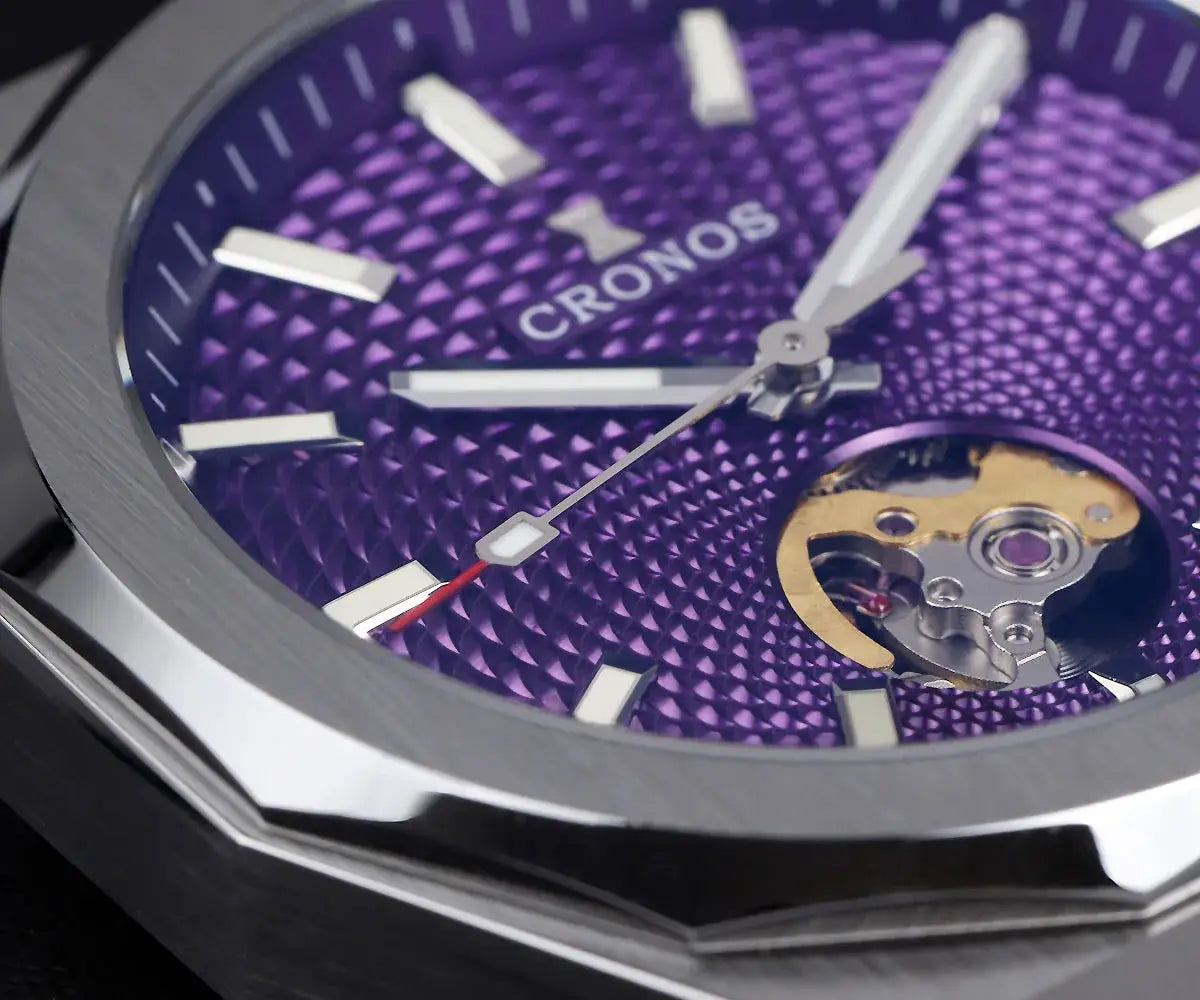 Cronos watch with purple skeleton dial and visible movement, stainless-steel case, see-through caseback.