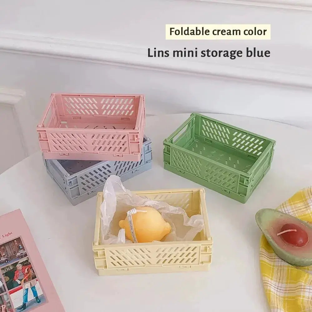 4 pastel plastic foldable storage baskets in pink blue green yellow for desktop organization