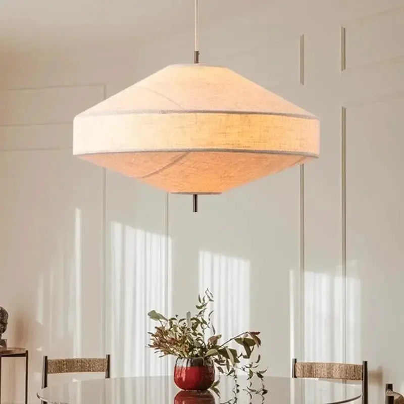 Simples Market Japanese Wabi Sabi fabric pendant light with cream shade over dining table