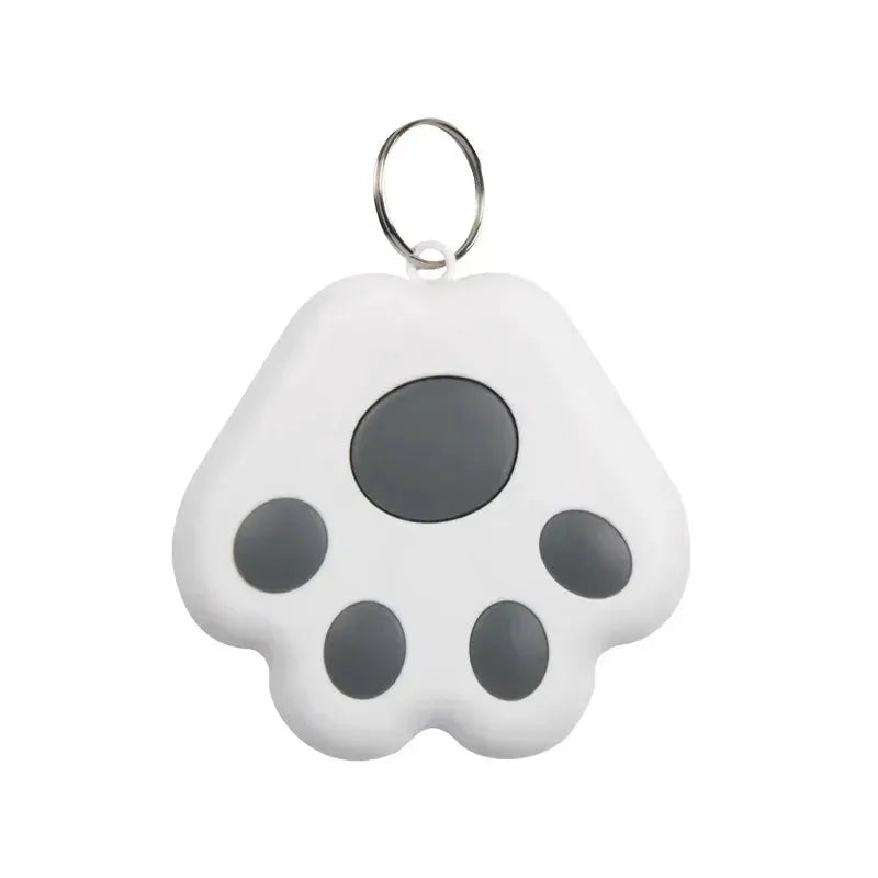 Mini paw-shaped pet tracker from Simples Market with gray paw pads and metal key ring