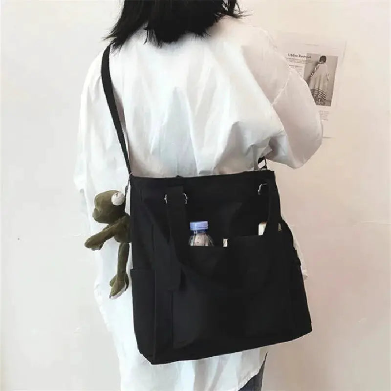 Waterproof Oxford large-capacity black women's handbag by Simples Market with shoulder strap