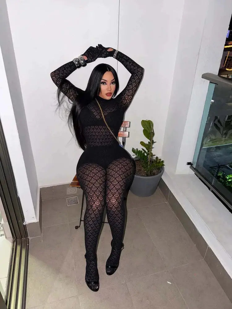 Women's lace mesh jumpsuit by Simples Market; black backless, bodycon fit.
