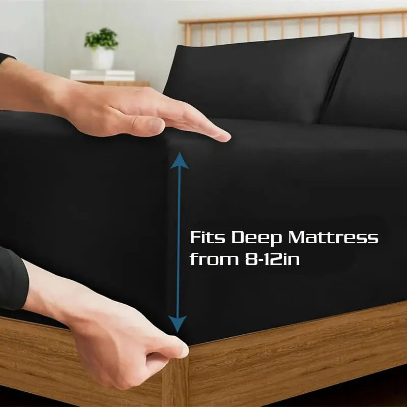 Soft cotton fitted sheet by Simples Market in black; fits deep mattresses 8-12 in.