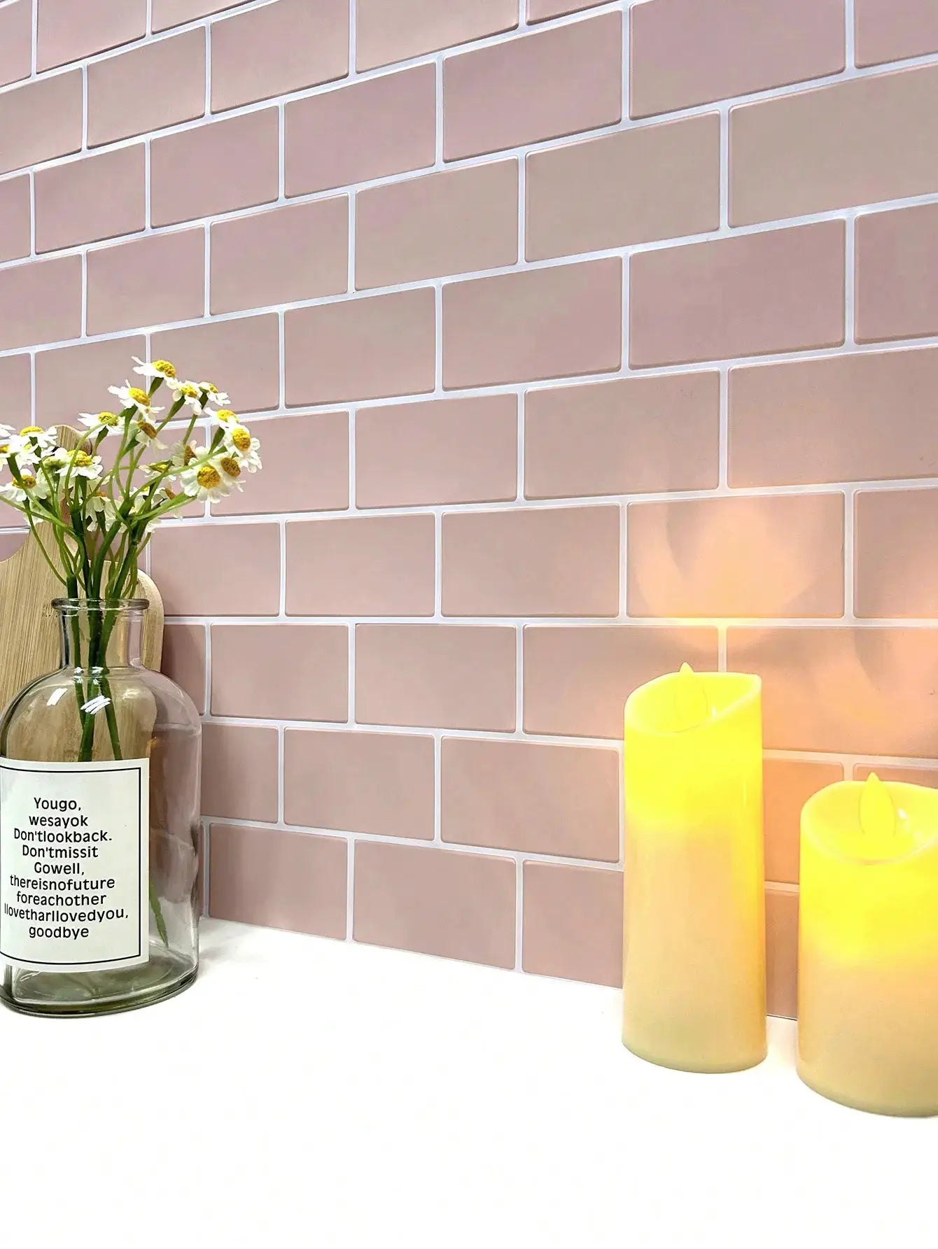 Backsplash tiles pink-beige brick pattern; waterproof peel-and-stick sheets (5/10) easy to clean
