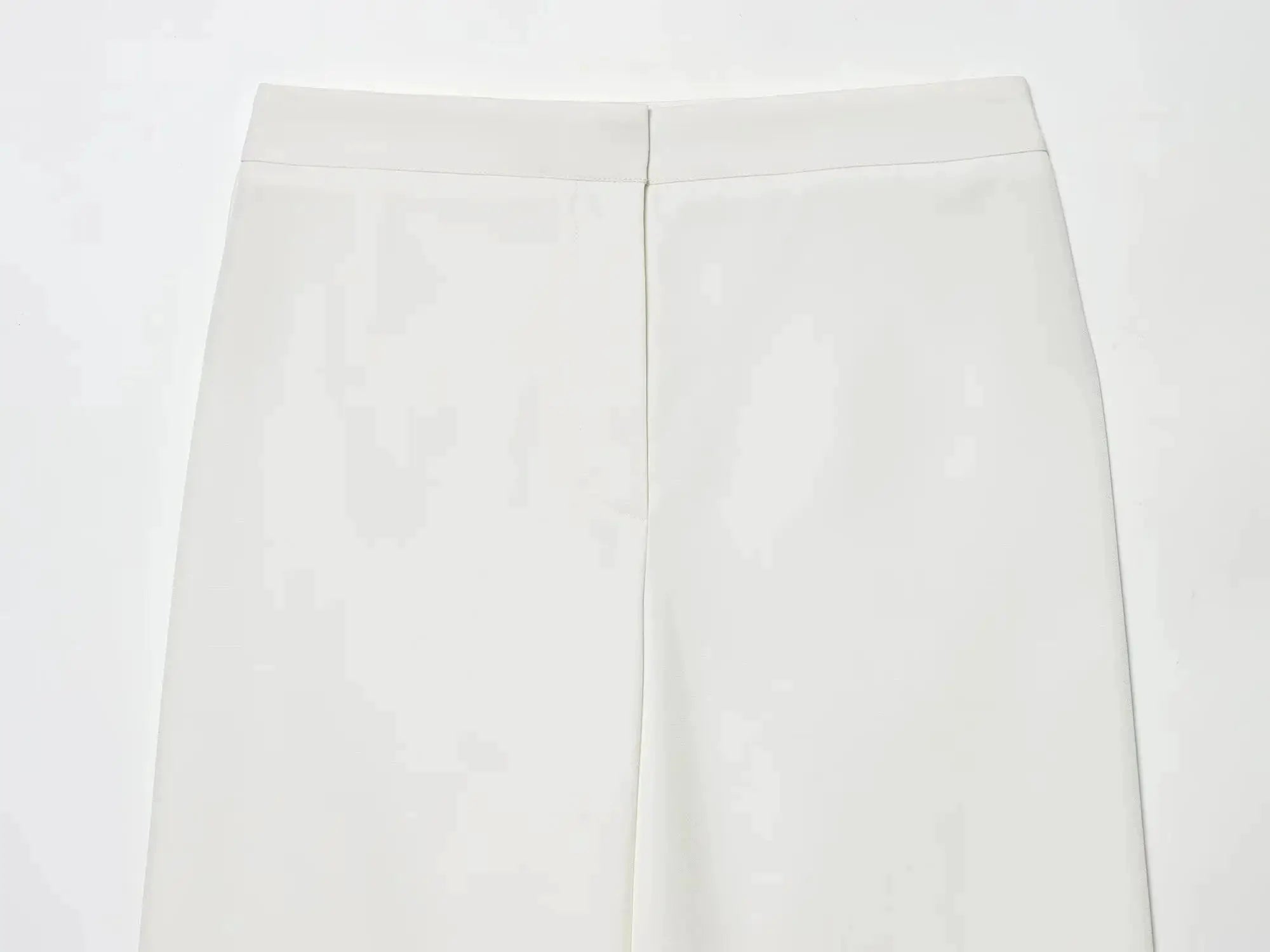 White women's dress pants with front center seam and tailored fit
