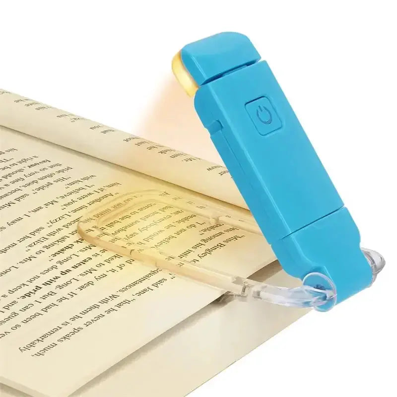 Blue Simples Market LED USB rechargeable clip-on book light for reading.