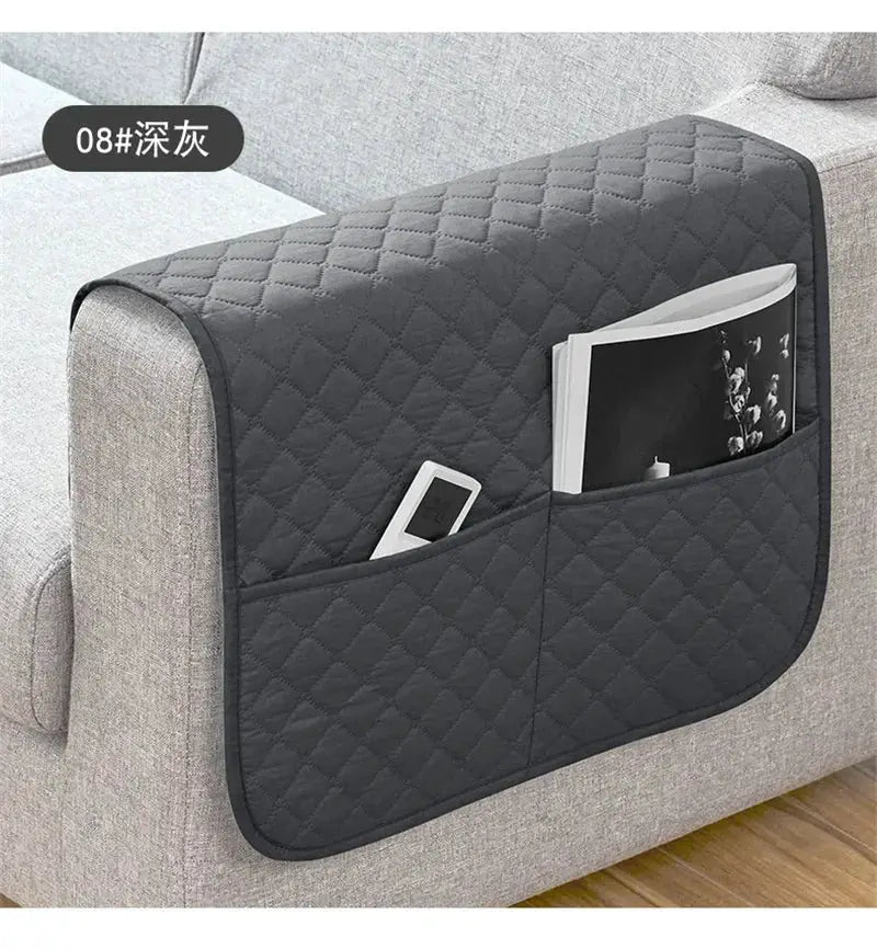 Sofa armrest cover with pockets, quilted dark gray, water-repellent fabric by Simples Market.