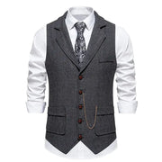 Men's charcoal grey herringbone tweed vest with lapel and brown buttons