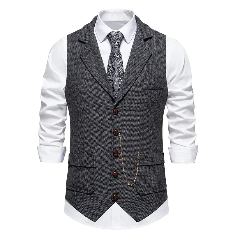 Men's charcoal grey herringbone tweed vest with lapel and brown buttons