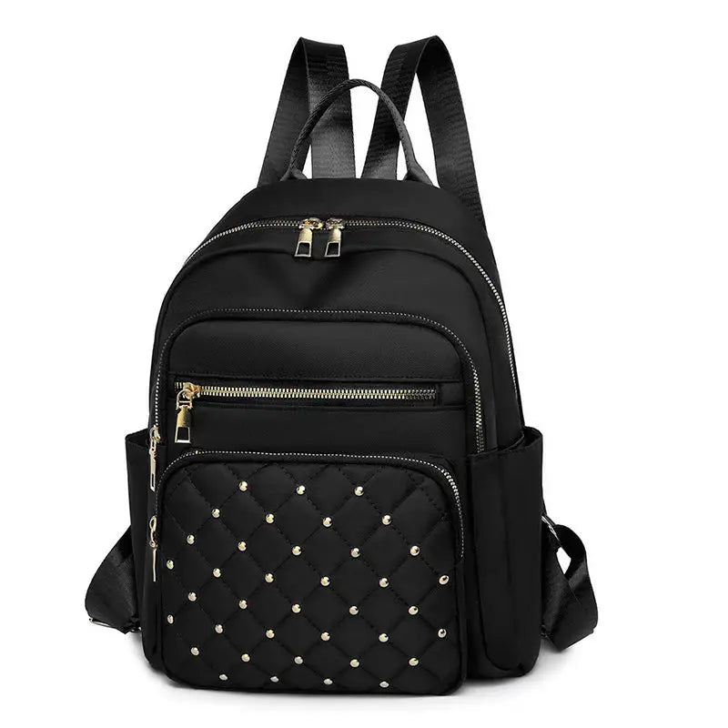 Travel backpack by Simples Market, black quilted-front pocket with gold studs, large-capacity double-shoulder bag