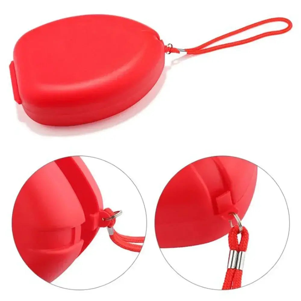 CPR rescue mask kit in a red compact oval case with a lanyard for emergency first aid