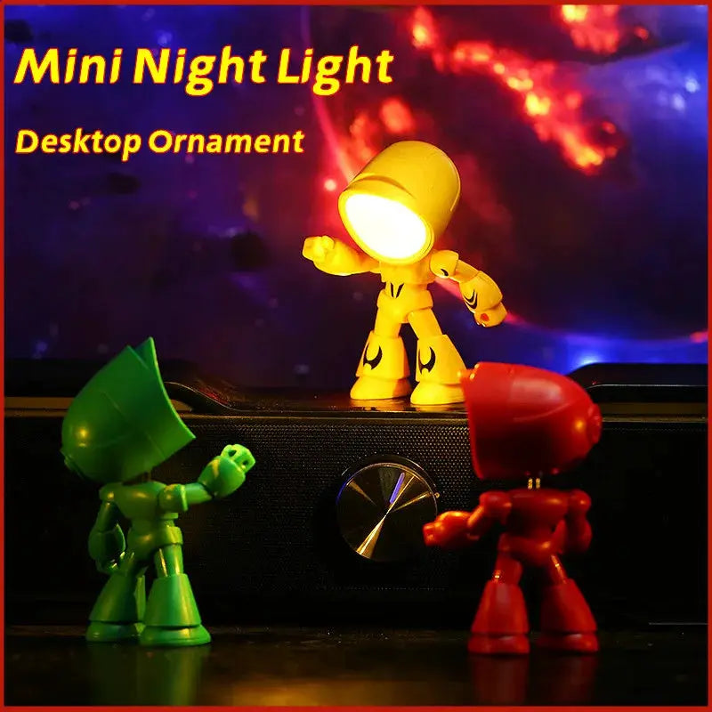 Mini Night Light LED cartoon hero police desk lamp, yellow figure on a black surface with green and red figures nearby