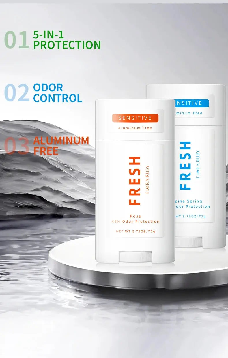 Two white deodorant sticks labeled FRESH on a pedestal, with orange and blue accents and 5-in-1 protection