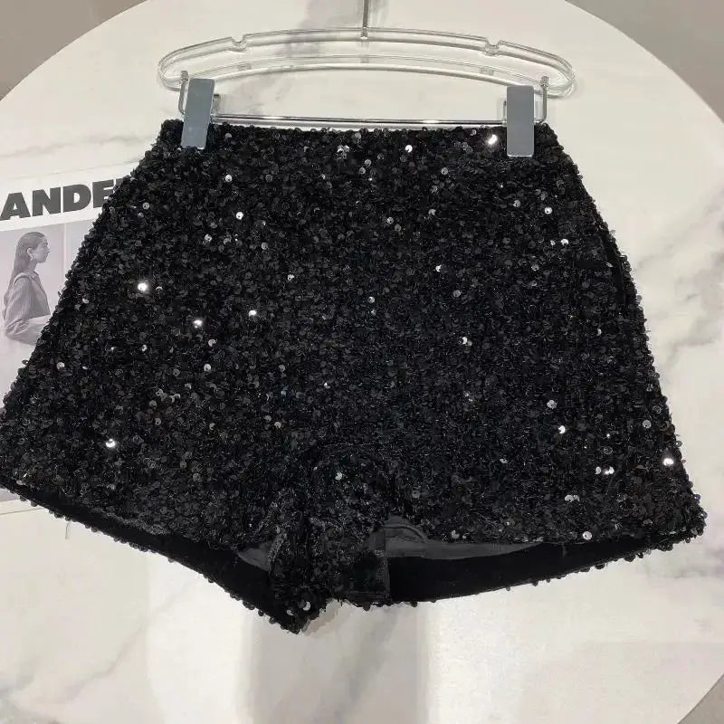 Women's black sequin velvet shorts, shiny clubwear hot pants.