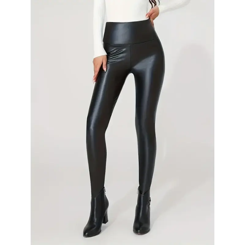 High-Waist faux leather pants, black, long and form-fitting with a sleek silhouette.