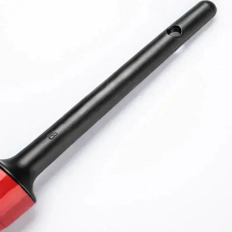 Car detailing brush by Simples Market, long black handle with red base
