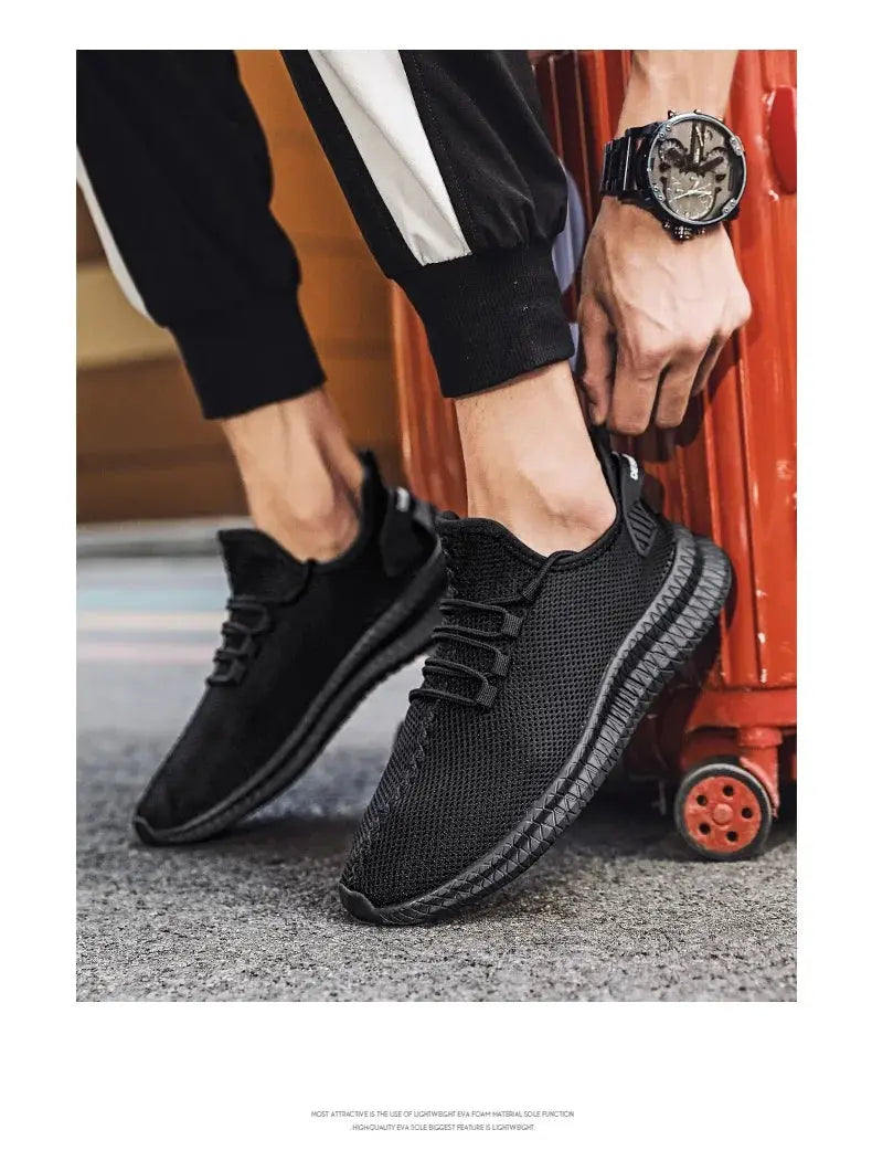 Men's black knit lace-up sneakers with breathable mesh and non-slip outsole
