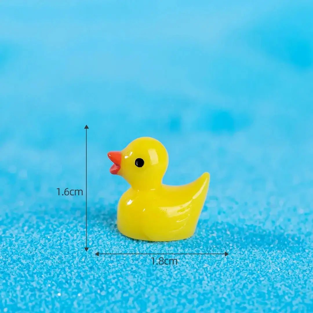 Yellow mini resin duck figurine, 1.6 cm tall and 1.8 cm long for garden crafts