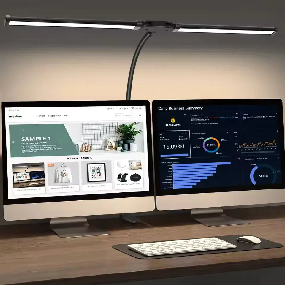 Eye-care LED clip-on desk lamp, black metal with flexible gooseneck, mounted above dual monitors