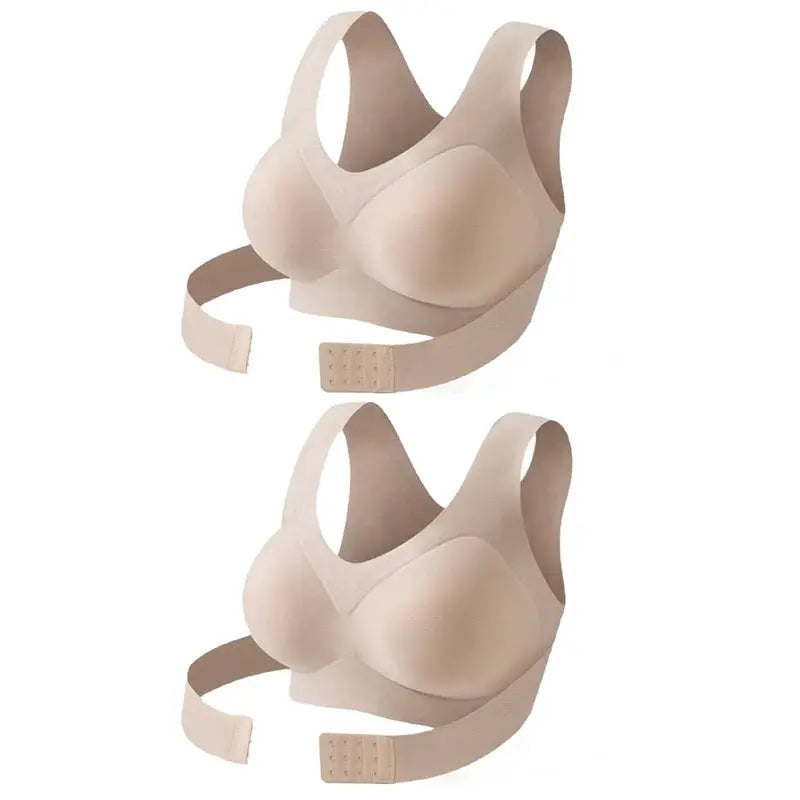 Two beige seamless wireless push-up bralettes for posture correction with cross-back straps