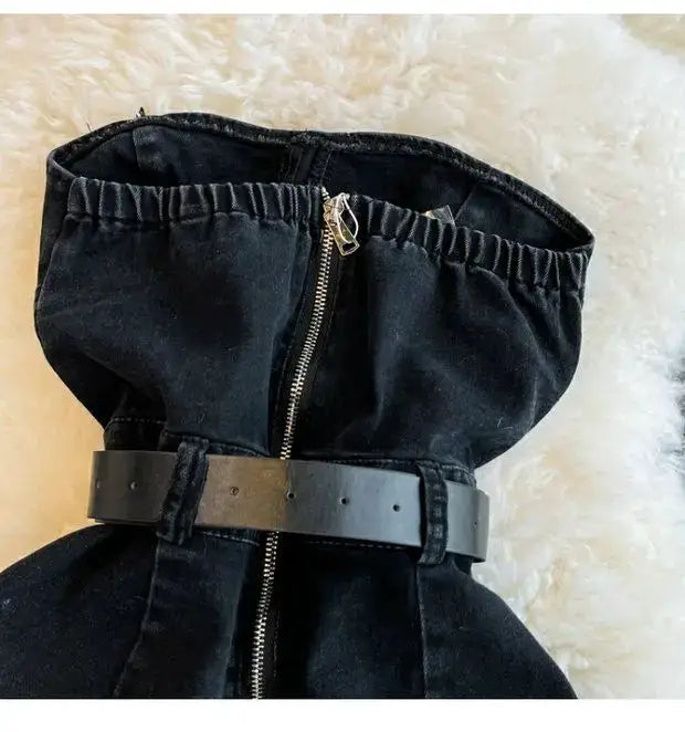 Black off-shoulder denim romper with front zipper and wide belt, casual wide-leg jumpsuit.