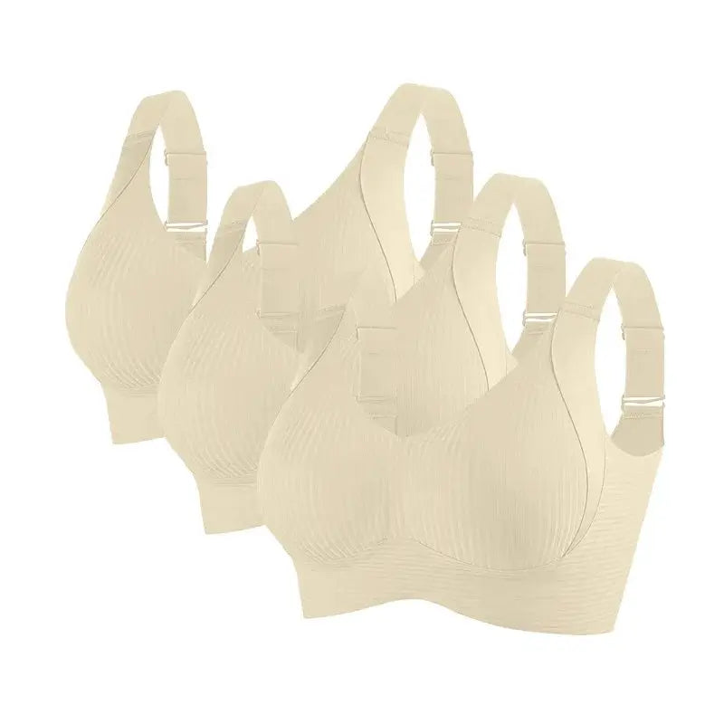 Five beige ribbed seamless non-wire bras in a beige set