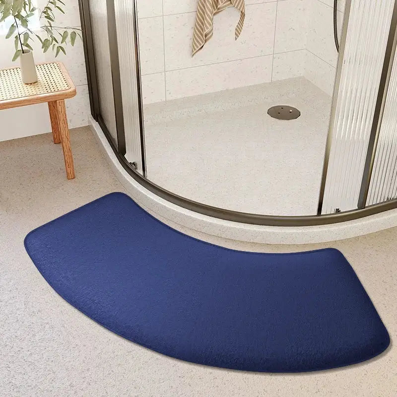 Thickened bathroom absorbent curved shower mat in blue by Simples Market