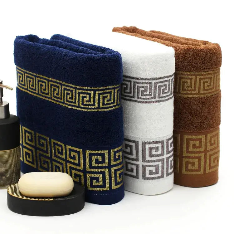3-piece cotton bathroom towel set with embroidered Greek key pattern in navy blue, white and brown