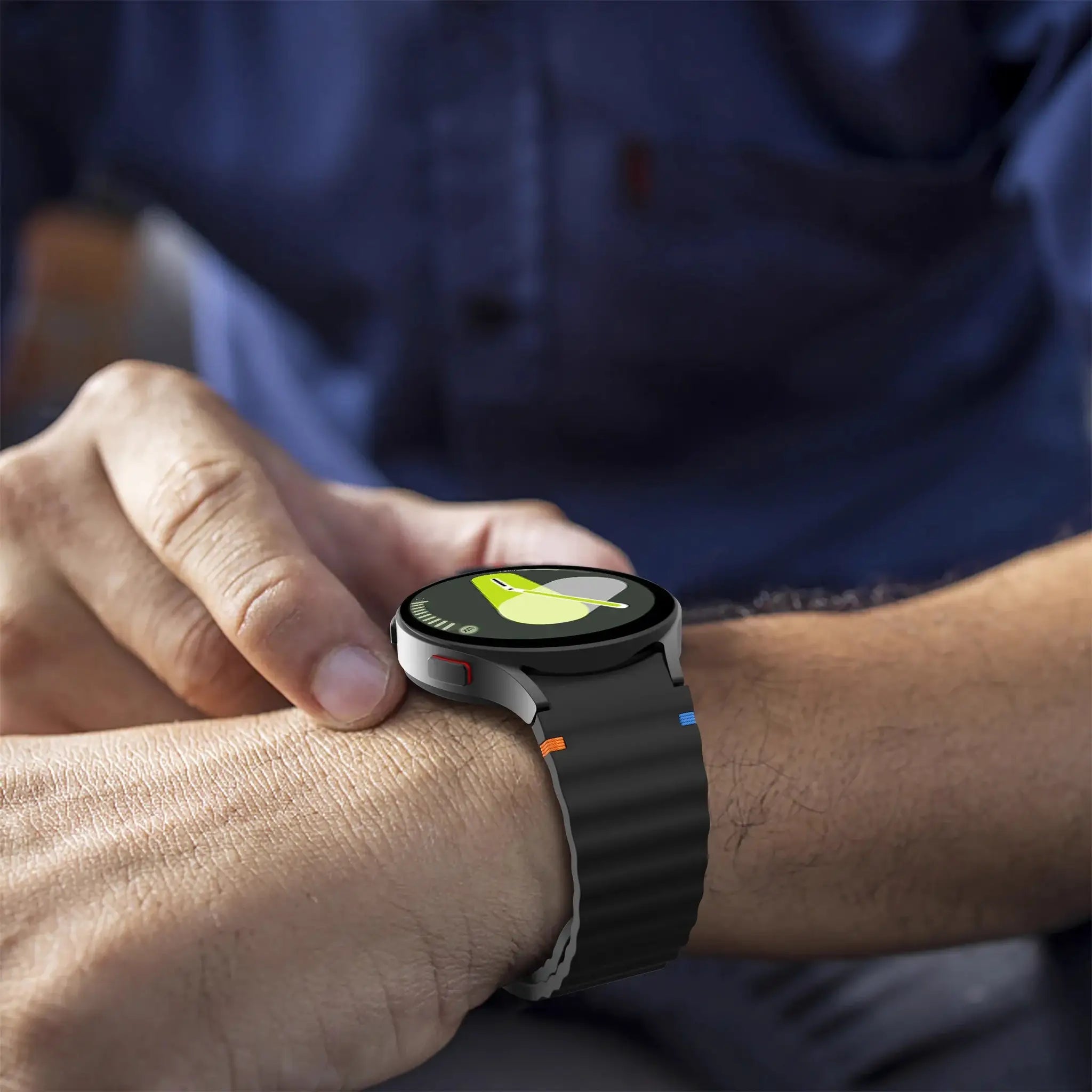 Simples Market silicone sport strap for Samsung Galaxy Watch (44mm/40mm), black with orange and blue stitch accents.
