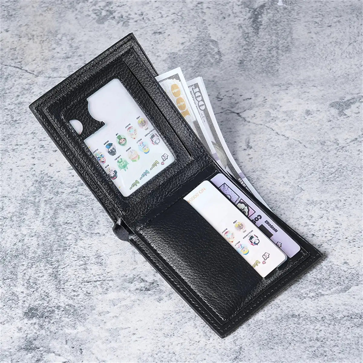 Slim black leather men's wallet with transparent ID window, multiple card slots and cash peeking out