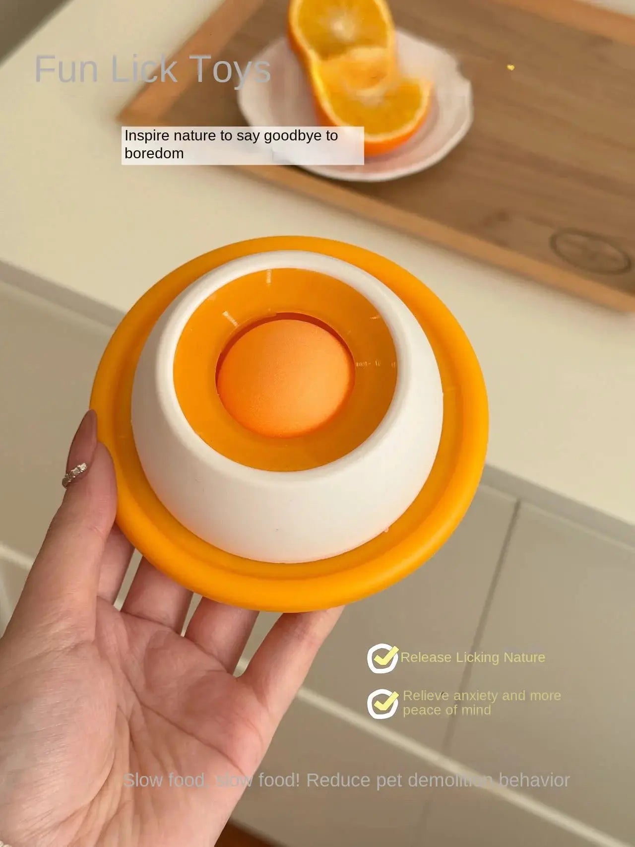 Lick Toys for Dogs interactive slow-feeder toy with orange ball inside white/orange ring