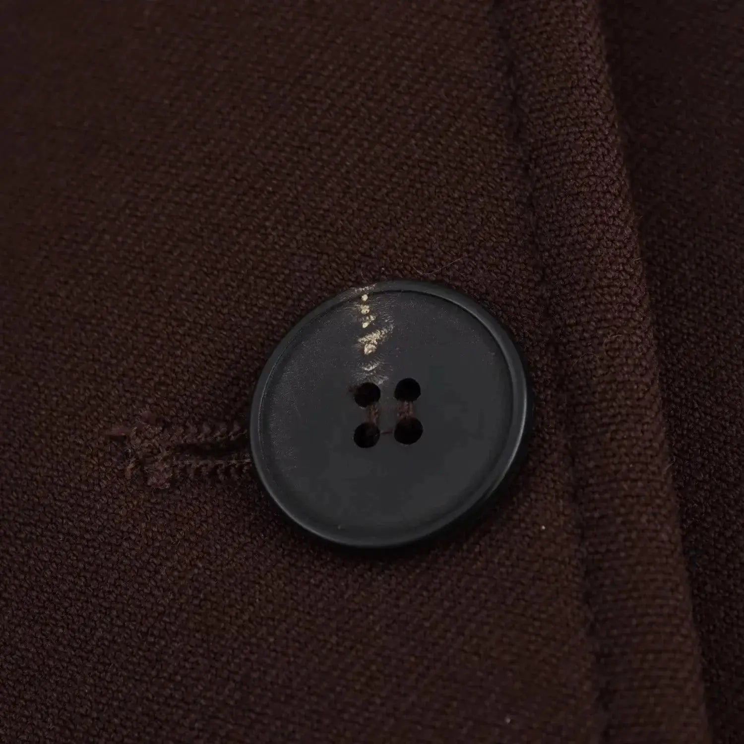 KONDALA brown textured blazer fabric close-up with a black four-hole button