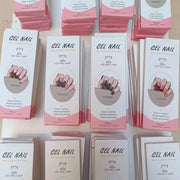 Gel Nail Wraps boxes by Simples Market; white and pink packaging with 60s LED nail lamp graphic, multiple packs displayed.