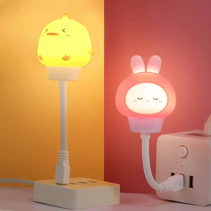 USB night light; two cartoon lights by Simples Market, yellow chick and pink bunny shapes, plug-in USB powered.