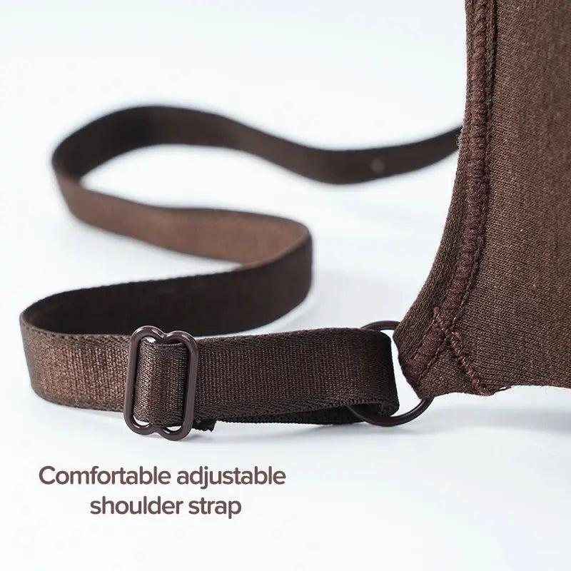 Women's brown cotton bra strap with adjustable metal buckle, close-up showing stitching and fabric edge