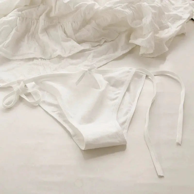 Simples Market white low-rise briefs with side ties and bows