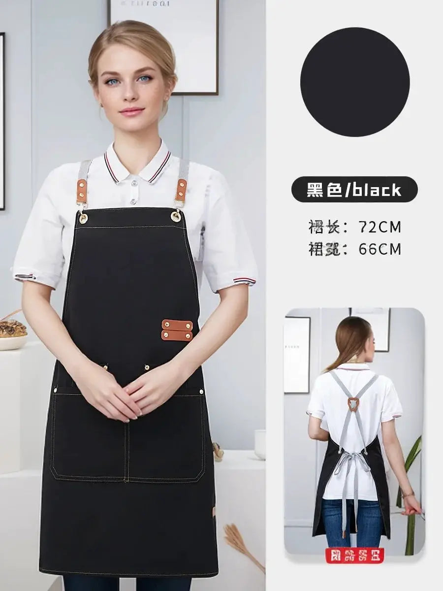 Waterproof kitchen apron by Simples Market in black with brown faux leather straps and front pockets