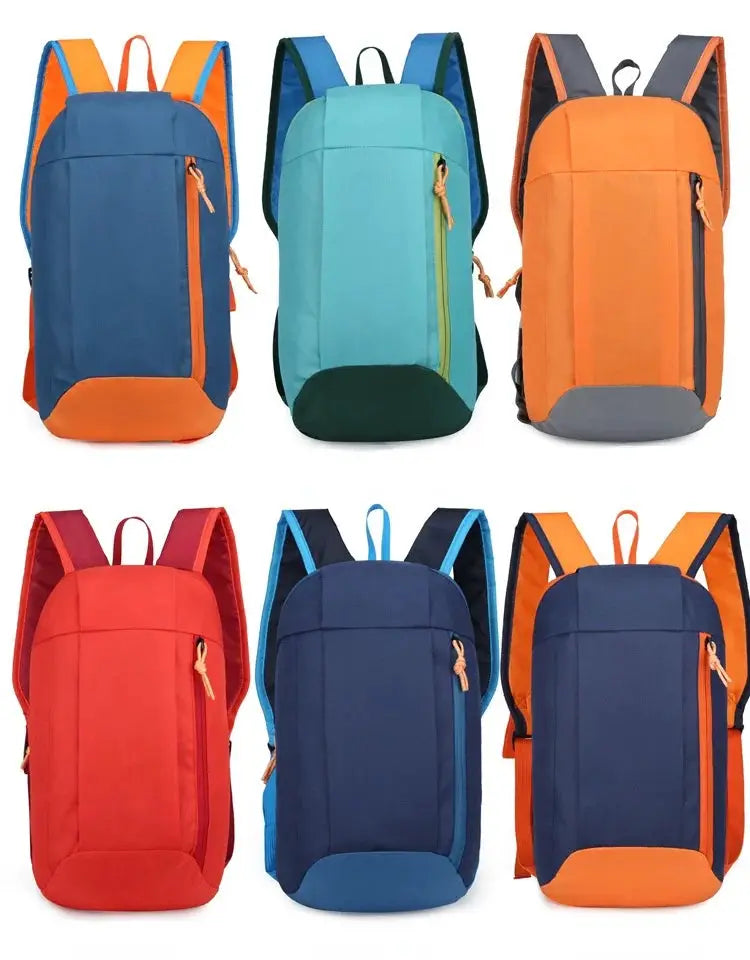 Six men's outdoor lightweight small sports backpacks in assorted colors displayed together for selection