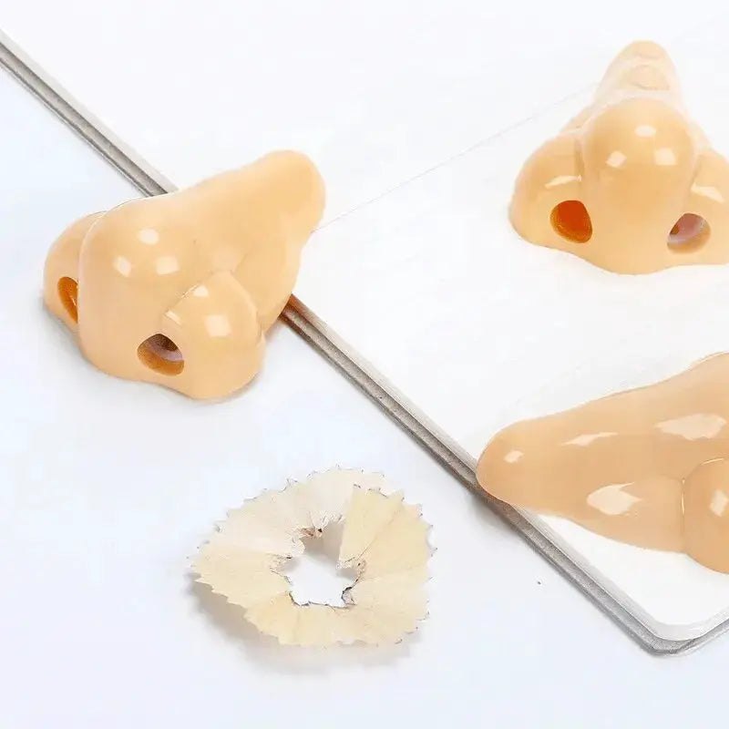 Nose-shaped pencil sharpeners by Simples Market; peach color, 3-piece novelty school supplies set
