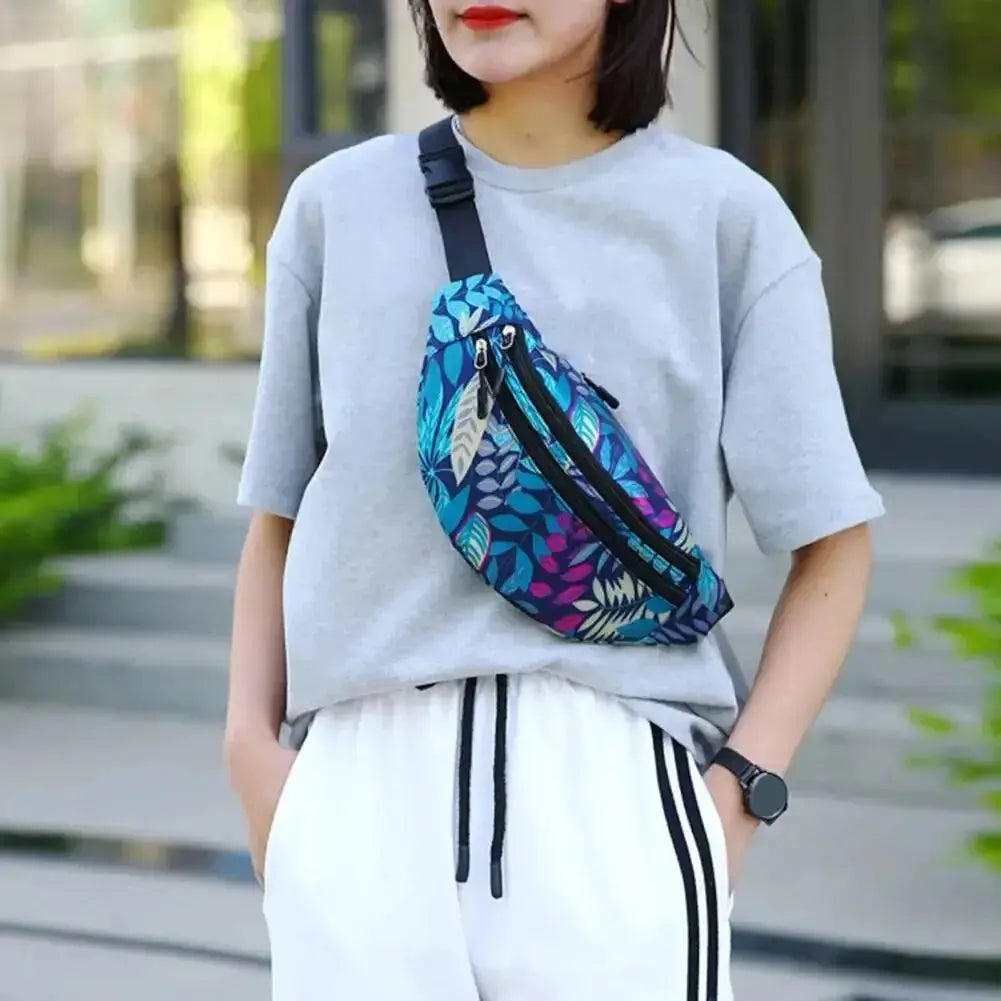 Sports waist pack by Simples Market with blue leaf-pattern fabric; waterproof running belt for men and women.