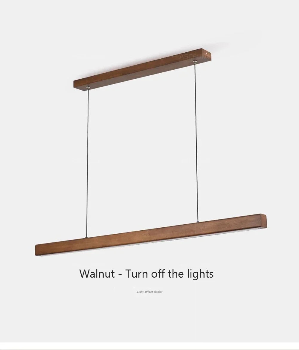 DAMIASMIL LED pendant light in walnut wood by Simples Market, a long dining strip chandelier.