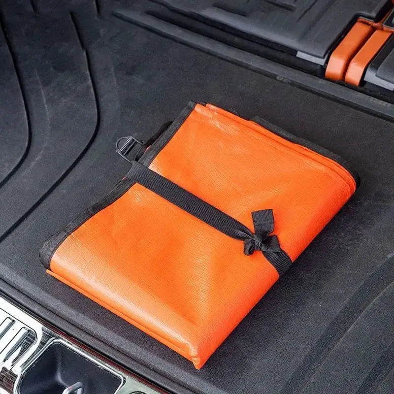 Universal Car Trunk Mat in orange storage pouch with black strap, waterproof cargo liner by Simples Market