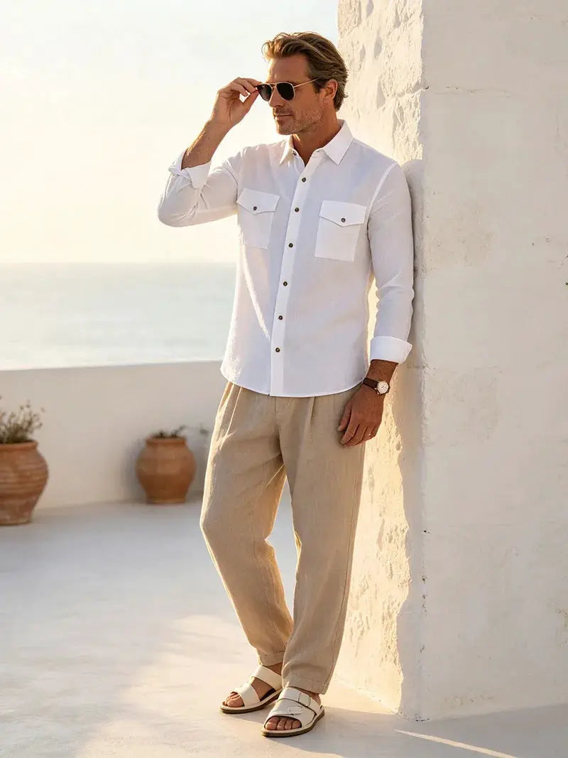 Men's white linen long-sleeve shirt with double chest pockets, button-up front.