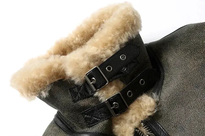 Leather fur jacket with tan shearling lining and buckle straps