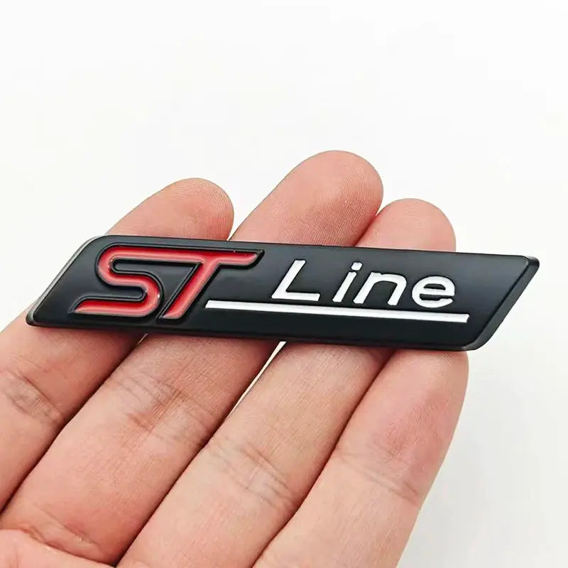 3D metal ST Line car badge emblem for rear trunk, black finish with red ST lettering and white Line text.